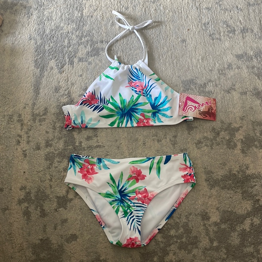 Kanu Surf bikini with white base color and floral patterns